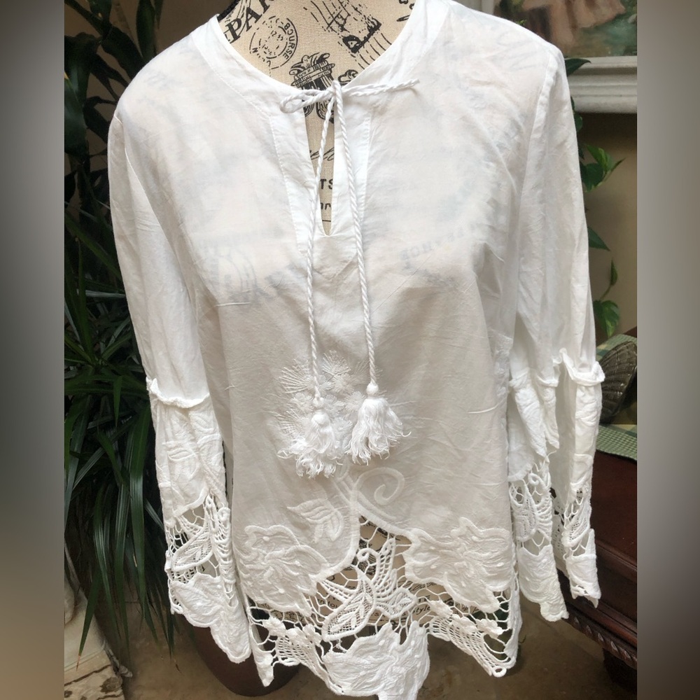 Beautiful Chico’s white tunic top with lovely embroidery  front & back. Size 1